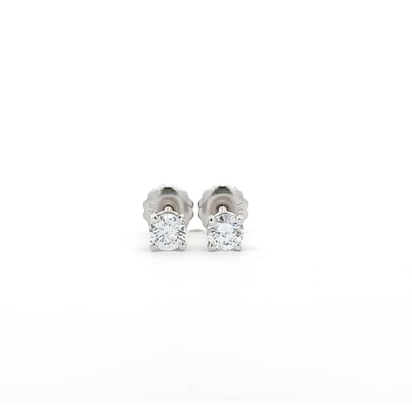 A pair of stud earrings featuring round, brilliant lab diamonds, totaling 0.50 carats, set in 14k white gold mounts, displayed against a plain white background.