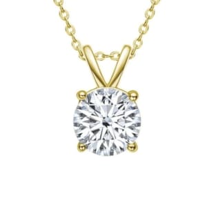 The .50pts Solitaire Lab Diamond Pendant in 14k White Gold showcases a prominent round-cut diamond set in a four-prong gold setting, elegantly suspended from a delicate chain, accentuating the brilliance of the diamond with its simple and sophisticated design.