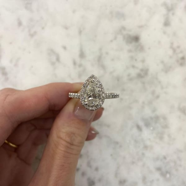 Stunning 1.50ct Pear Lab Diamond Engagement Ring with Halo. A perfect blend of modern brilliance and timeless elegance, designed to celebrate your love.