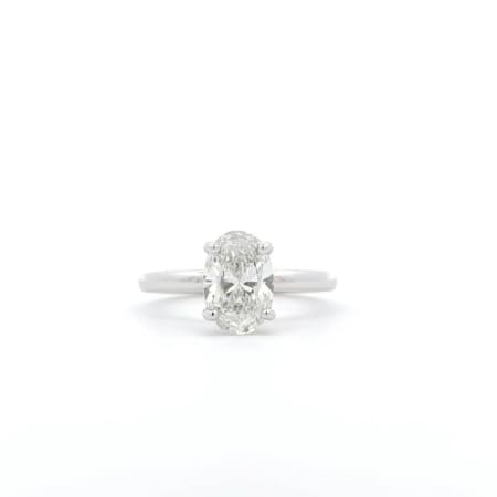 The 1.71ct Oval Lab Grown Diamond Engagement Ring is showcased on a white background, featuring a dazzling oval-cut diamond at its center.