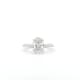 The 1.71ct Oval Lab Grown Diamond Engagement Ring is showcased on a white background, featuring a dazzling oval-cut diamond at its center.