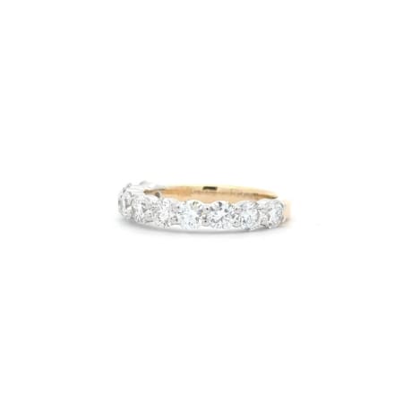 A 1.77ct Round Brilliant Cut Lab Diamond Half Eternity Ring, featuring a row of captivating round brilliant-cut lab diamonds set along the band, displayed against a plain white background.