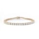 The 3ct Lab Grown Diamond Tennis Bracelet in 14k Yellow Gold is beautifully displayed on a plain white background, featuring a series of sparkling round diamonds set symmetrically.
